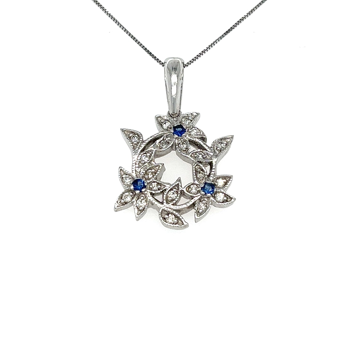 14KT WHITE GOLD DIAMOND FLOWER HALO PENDANT