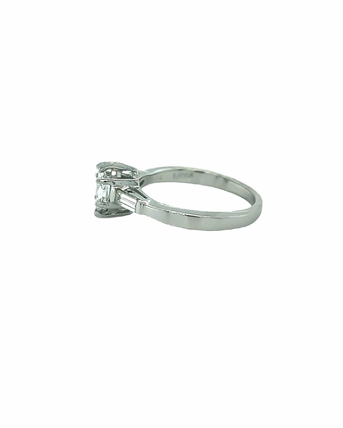 FANCY PLATINUM RING WITH A MARQUISE DIAMOND AND BAGUETTE ACCENT DIAMONDS ON THE SIDES