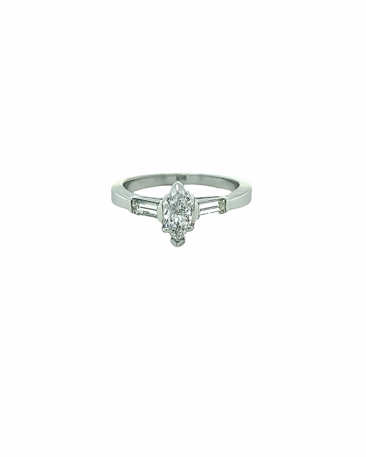 FANCY PLATINUM RING WITH A MARQUISE DIAMOND AND BAGUETTE ACCENT DIAMONDS ON THE SIDES