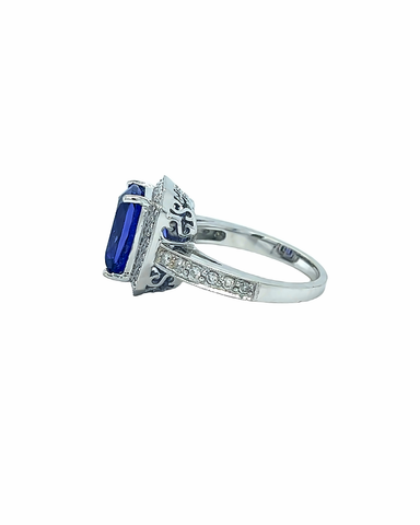 18KT WHITE GOLD DIAMOND AND TANZANITE ENGAGEMENT RING