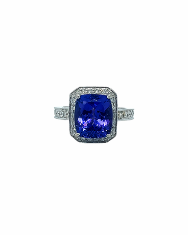 18KT WHITE GOLD DIAMOND AND TANZANITE ENGAGEMENT RING