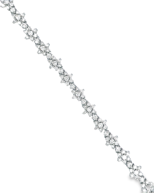 18KT WHITE GOLD FLOWER DIAMOND TENNIS BRACELET