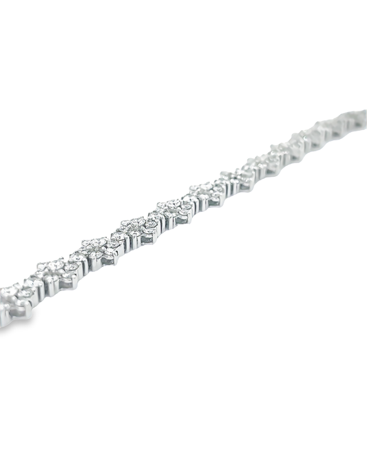 18KT WHITE GOLD FLOWER DIAMOND TENNIS BRACELET